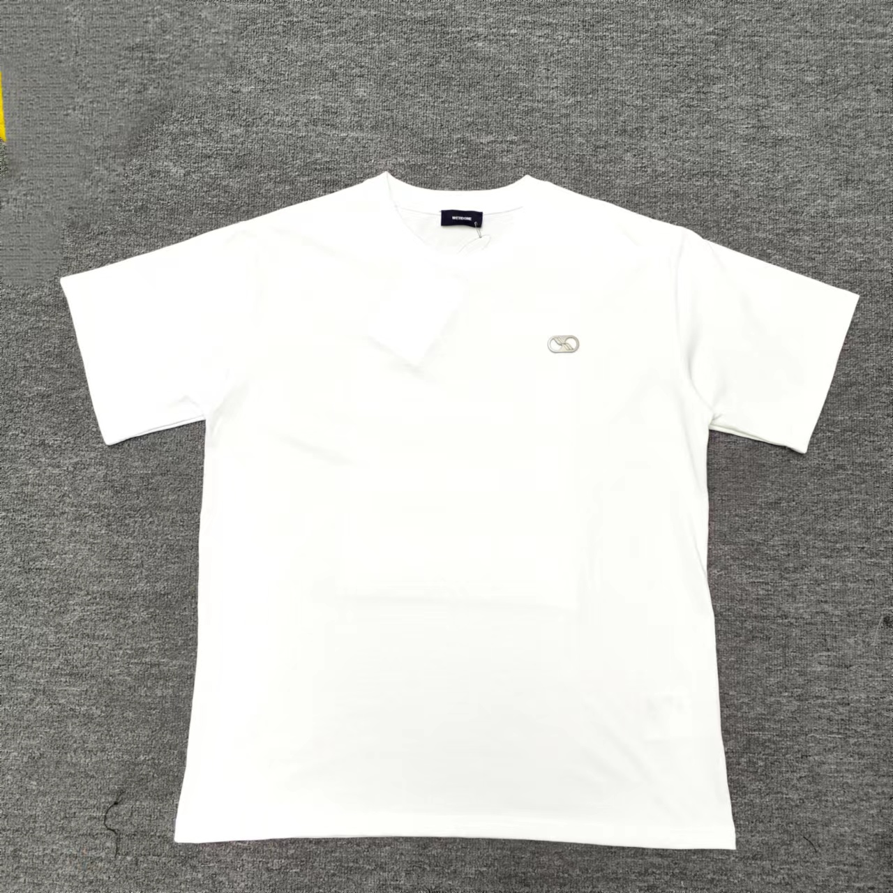 WE11D0NE TRACK Embossed Banner T-Shirt