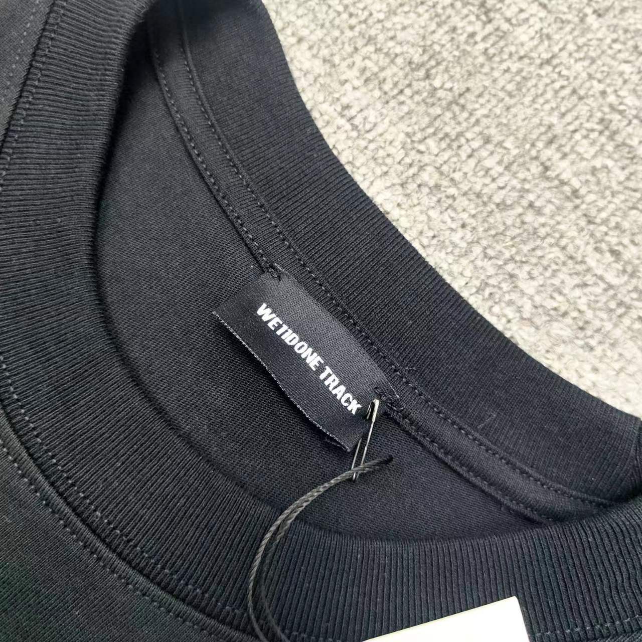 WE11D0NETRACK FUTURELISM&ARCHIVE T-Shirt