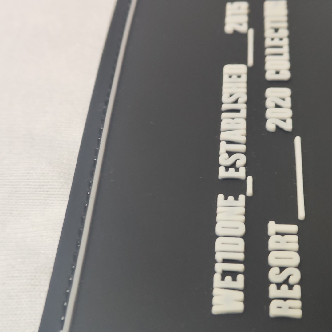 WE11D0NE Embroidered Logo Simple Color T-Shirt